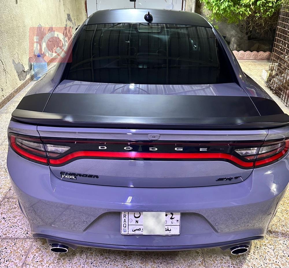 دۆج چارجەر